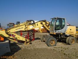 New Holland MH 5.6 gumikerekes kotró