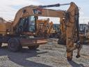 Caterpillar M315D gumikerekes kotró