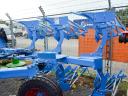 Lemken Juwel 7 M 3 N 100 on a set of rotating ploughs