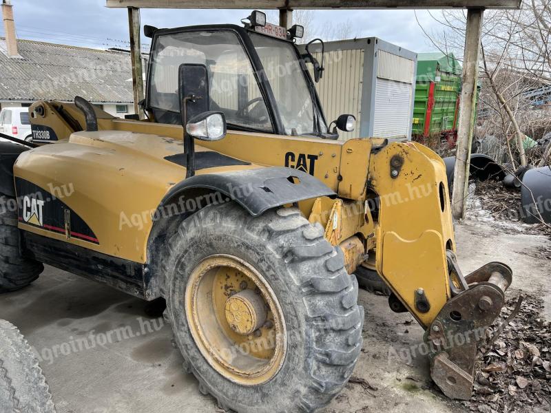 Caterpillar TH330B teleszkópos rakodó,  trágyarakó kanállal