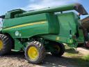 John Deere T660i 4WD (882/1.473 Betriebsstunden)