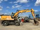 Liebherr A900C gumikerekes kotró