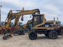 Caterpillar M315 gumikerekes kotró