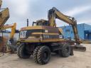 Caterpillar M315 gumikerekes kotró