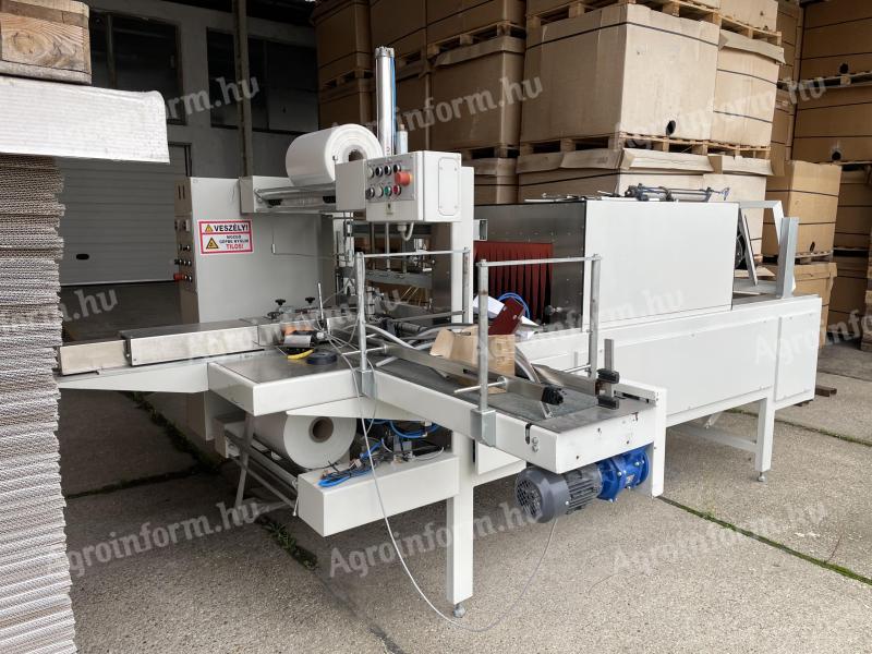 Shrink wrapping machine