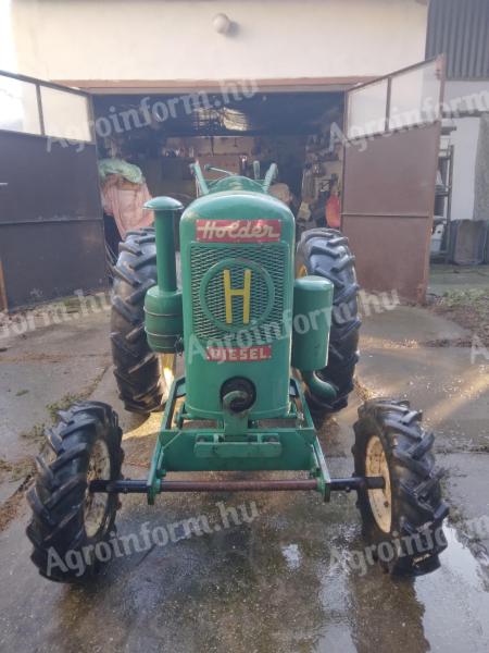 Holder tractor cu o singură axă