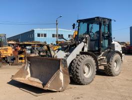Caterpillar 908H homlokrakodó