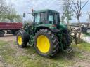 John Deere 6910 Stoll homlokrakodóval