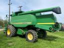 John Deere W650 combine (3325/5057 hours)