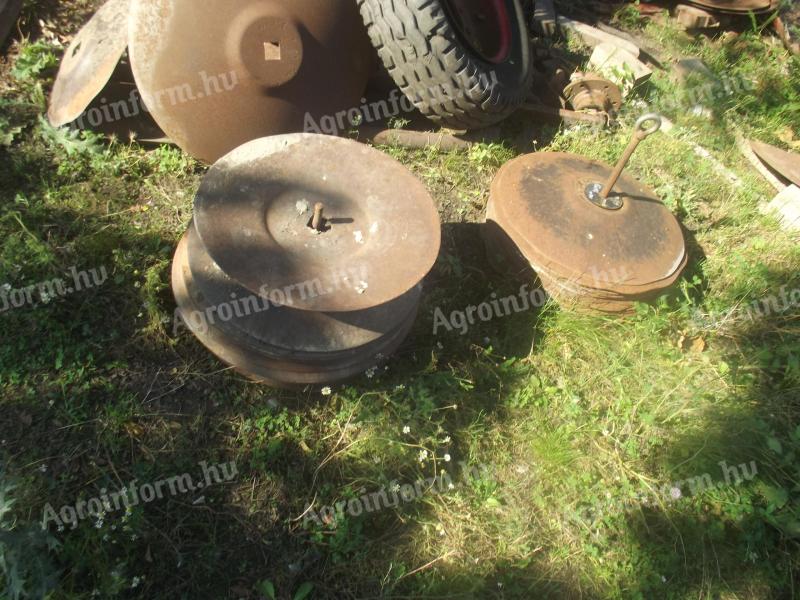 Various sizes of dial plates for sale.