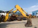 Komatsu WB93R-2 mașină combinată cu excavator-încărcător