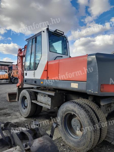 O&K MH Plus rotary excavator with rubber wheels