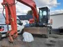 O&K MH Plus rotary excavator with rubber wheels