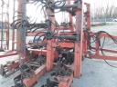 Rotary tine seedbed preparation steering wheel