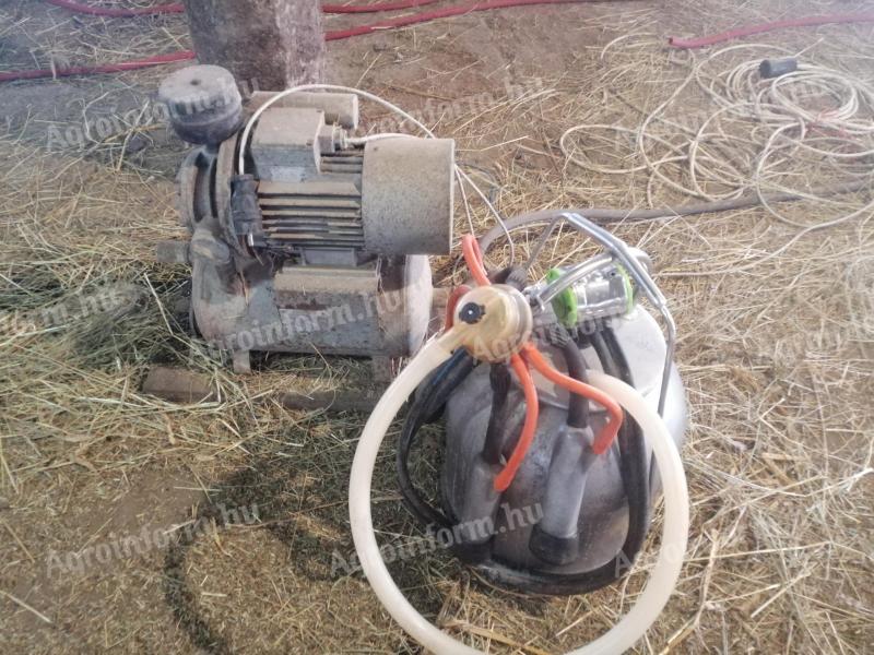 Milking machine + vacuum pump