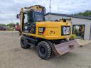 Vrtljivi bager z gumijastimi kolesi Caterpillar M313D