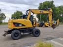 Vrtljivi bager z gumijastimi kolesi Caterpillar M313D