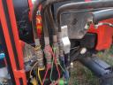 Traktor Kubota MU 4501 4x4 s sprednjim nakladalnikom in nabiralnikom bal, z ogrevano kabino