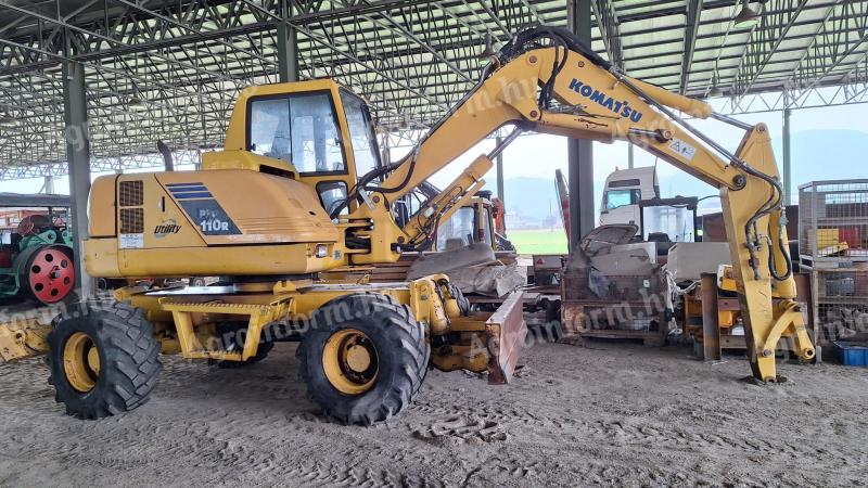 Bager Komatsu PW 110