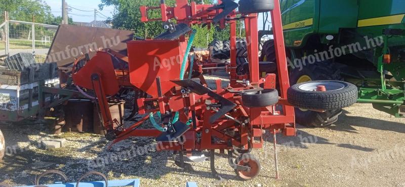 Row cultivator - cultivator with filling tine