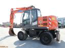 Hitachi ZX145 W-3 bager z gumijastimi kolesi