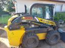 For sale: like new New Holland L318 loader - 285 hours - with trencher adapter and pallet fork