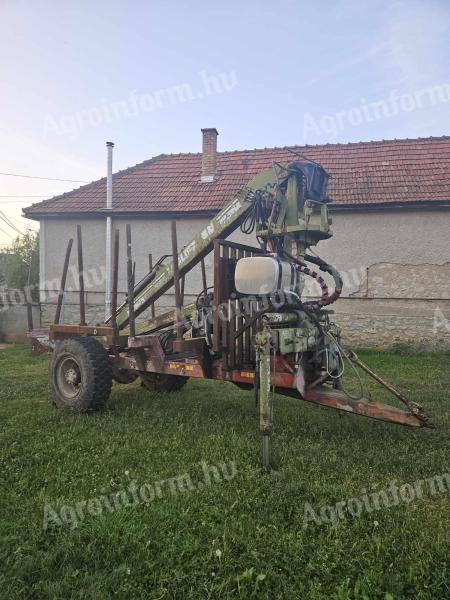 Intermediate powered crane trailer