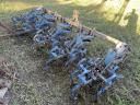 Row crop and field cultivator