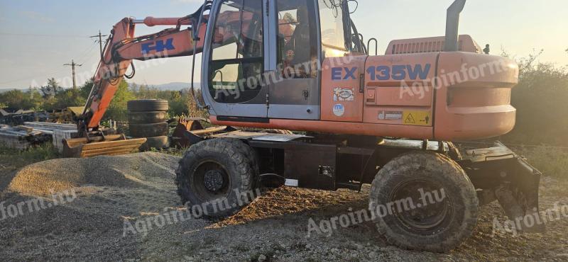 Fiat-Kobelco EX135W + Rototilt excavator cu roți de cauciuc