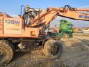 Fiat-Kobelco EX135W + Rototilt excavator cu roți de cauciuc