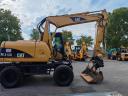 Excavator rotativ cu roți de cauciuc Caterpillar M313C