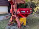 Fertilizer spreader coupled crane