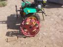 For sale two-wheeled small tractor with accessories, 16 hp