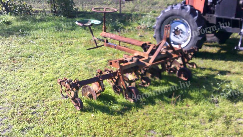 Heger steerable gardening 4 row row cultivator with row guard with disc