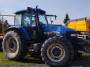 TM 155 New Holland s kompletom koles za kultivator za prodajo