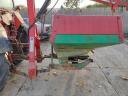 Fertilizer spreader with bull bag lifter