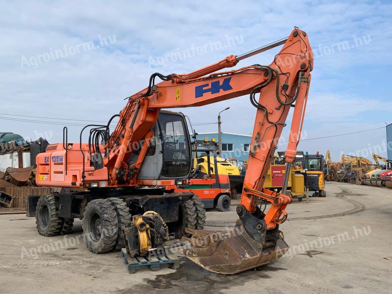 Rýpadlo Fiat-Kobelco EX135W + Rototilt s gumovými koly