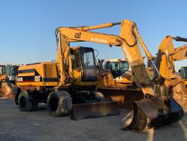 Caterpillar M315 gumikerekes kotró