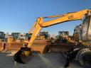 Excavator cu roți de cauciuc Caterpillar M315