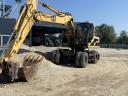 Caterpillar M318 selbstfahrender Lader