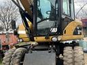 Predám Caterpillar M313D v dobrom stave