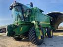 John Deere W650 combine with adapters