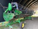 John Deere W650 combine with adapters