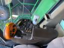 John Deere W650 combine with adapters