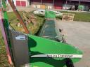 John Deere W650 combine with adapters