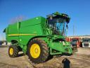 John Deere S670i all-wheel drive combine