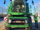 John Deere S670i all-wheel drive combine