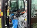 Miniciągnik Kubota KX018-4 typu G, z zamkniętą kabiną, na gąsienicach gumowych