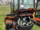 Miniciągnik Kubota KX018-4 typu G, z zamkniętą kabiną, na gąsienicach gumowych