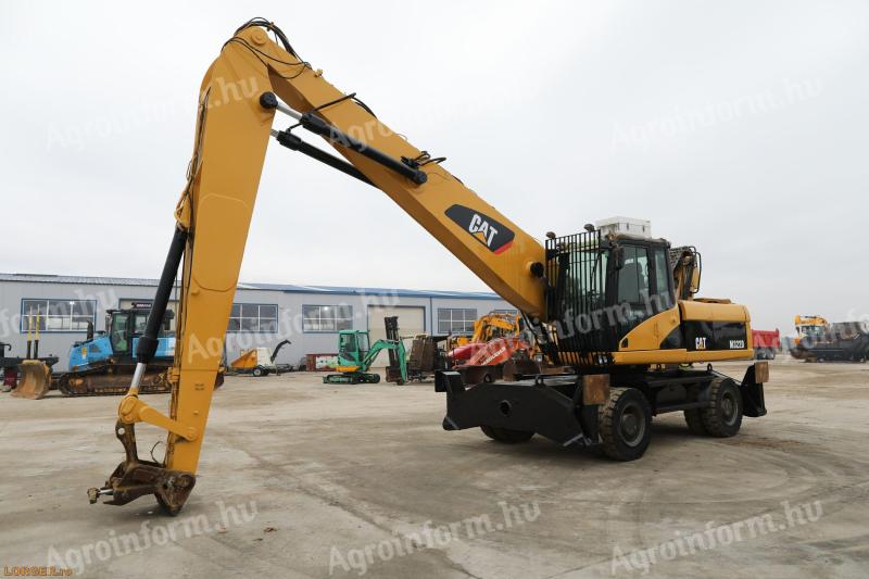 Excavator cu roți de cauciuc Caterpillar M322 D